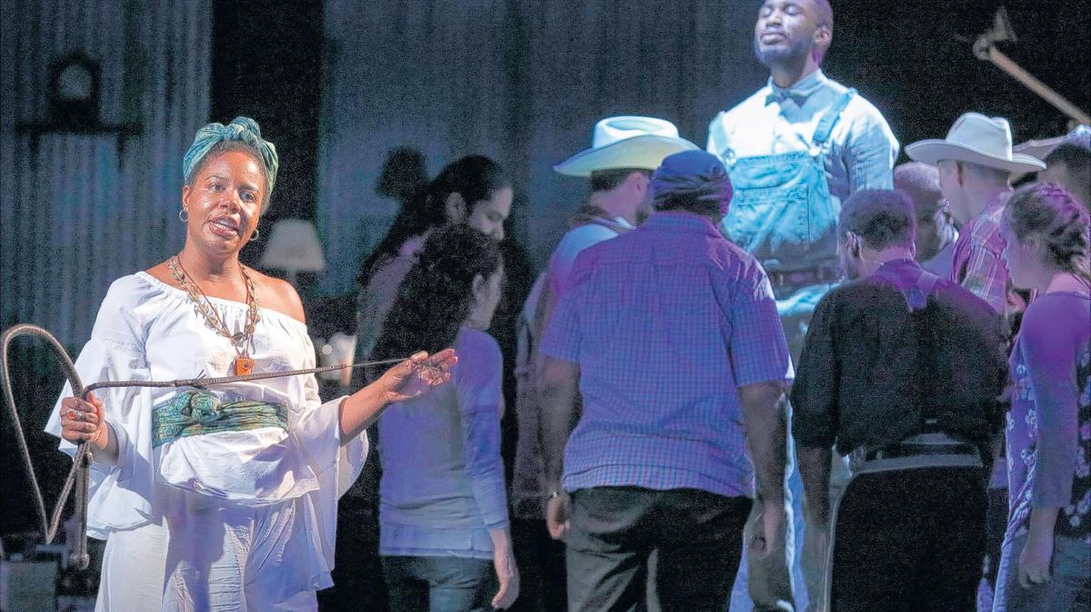 
From left, Tangela Large as Selah,Tristan Parks as Moses Lightfoot and the ensemble in PlayMakers Repertory Company's production of “Leaving Eden.”
