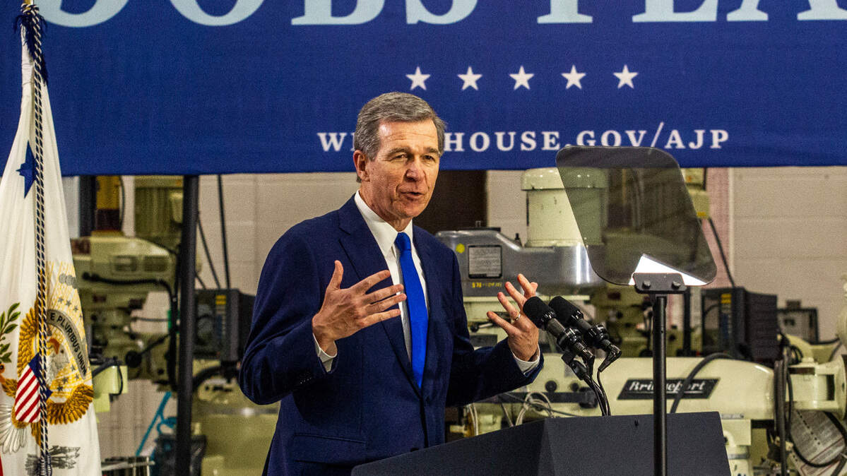 Gov. Roy Cooper speaks during an event touting the Biden administration’s infrastructure plan Monday, April 19, 2021 at Guilford Technical Community College in Jamestown, NC.