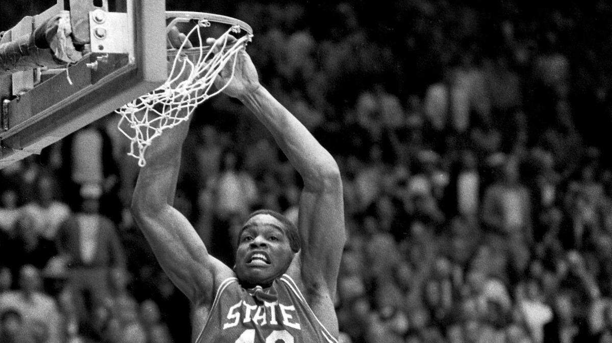 North Carolina State’s Lorenzo Charles (43) dunks the ball in the basket to give N.C. State a 54-52 win over Houston in the NCAA Championship game in Albuquerque, N.M., Monday, April 4, 1983.