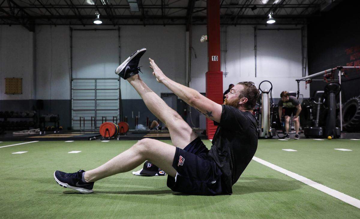 Scott Darling, the goalie for the Carolina Hurricanes, trains at The Performance Academy at Raleigh Orthopedic on Monday July 2, 2018.