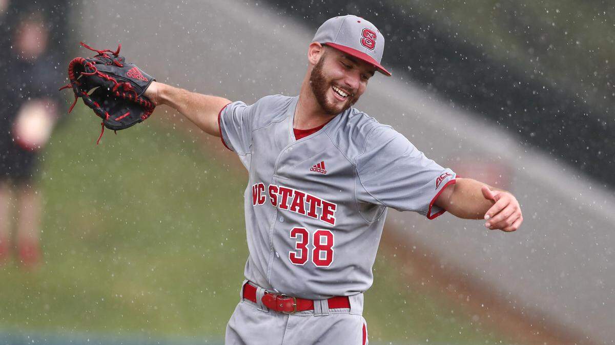 N.C. State pitcher Brian Brown (38) celebrates after the Wolfpack's 9-3 victory over Northeastern in the Raleigh Regional at Doak Field Saturday, June 2, 2018.