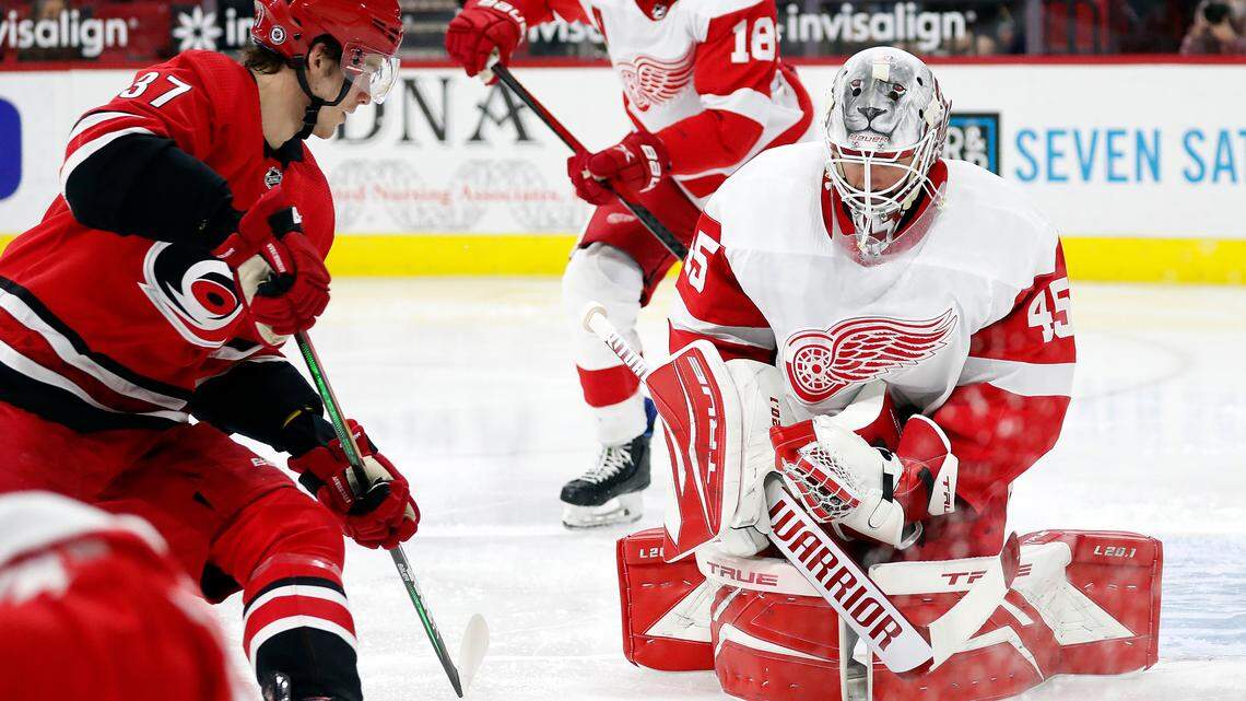 Carolina Hurricanes’ Andrei Svechnikov (37) has his shot blocked by Detroit Red Wings goaltender Jonathan Bernier (45) during the second period of an NHL hockey game in Raleigh, N.C., Thursday, April 29, 2021. (AP Photo/Karl B DeBlaker)