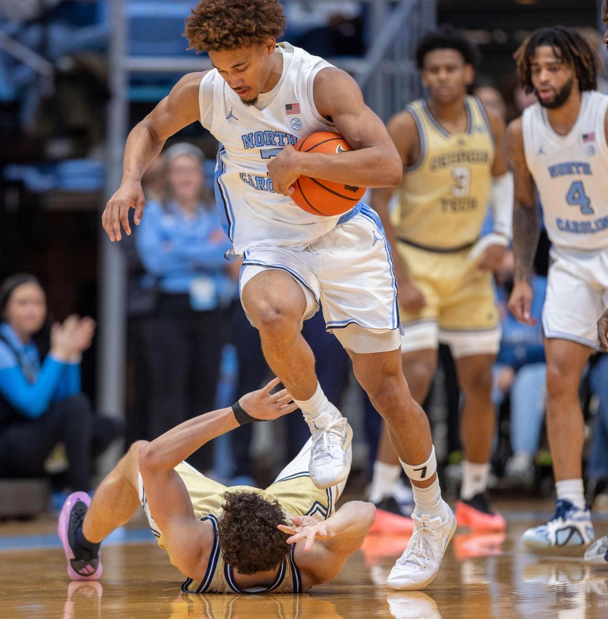 North Carolina guard Seth Trimble (7) makes a steal from Georgia Tech forward Lance Terry (0) in the first half on Saturday, December 7, 2024 at the Smith Center in Chapel Hill, N.C.