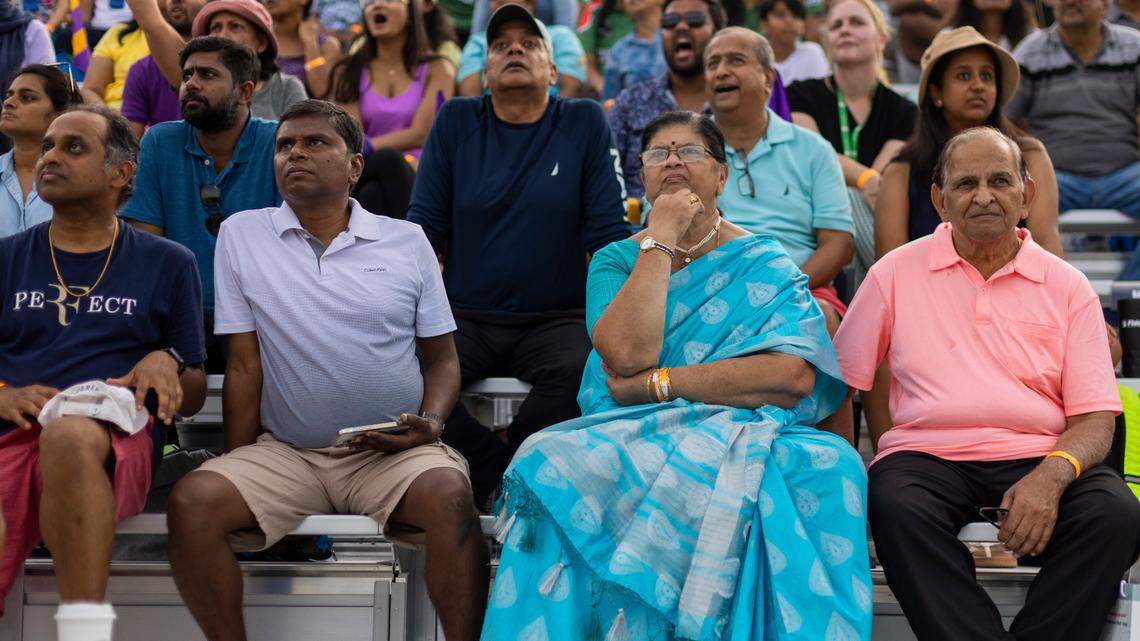 Dressed in a traditional sari, Dr. Rohini Rao of Morrisville, watches the Major League Cricket match between the Washington Freedom and the LA Knight Riders on Thursday, July 20, 2023 at Church Street Park in Morrisville, N.C.