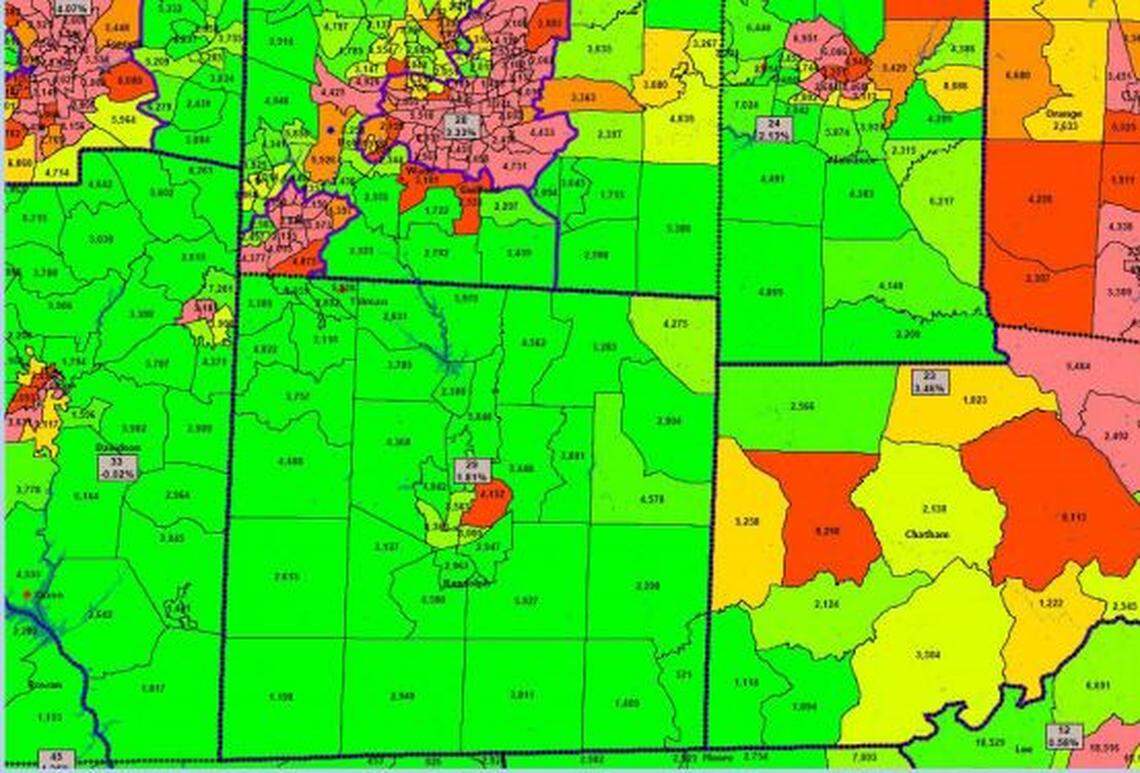 A North Carolina Senate district covering Republican-heavy Randolph County extends north to include mostly Democratic High Point in southwest Guilford County. The map coded Republican-leaning areas in shades of green and Democratic areas in red and pink.