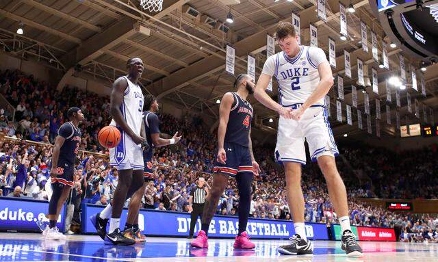 Duke’s Cooper Flagg (2) and Khaman Maluach (9) celebrate after Flagg made the basket while being fouled during Duke’s 84-78 victory over Auburn at Cameron Indoor Stadium in Durham, N.C., Wednesday, Dec. 4, 2024.