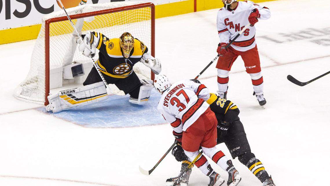 Carolina Hurricanes’ Andrei Svechnikov (37) scores on Boston Bruins goaltender Tuukka Rask (40) during the second period of an NHL Eastern Conference Stanley Cup hockey playoff game in Toronto, Thursday, Aug. 13, 2020. (Chris Young/The Canadian Press via AP)