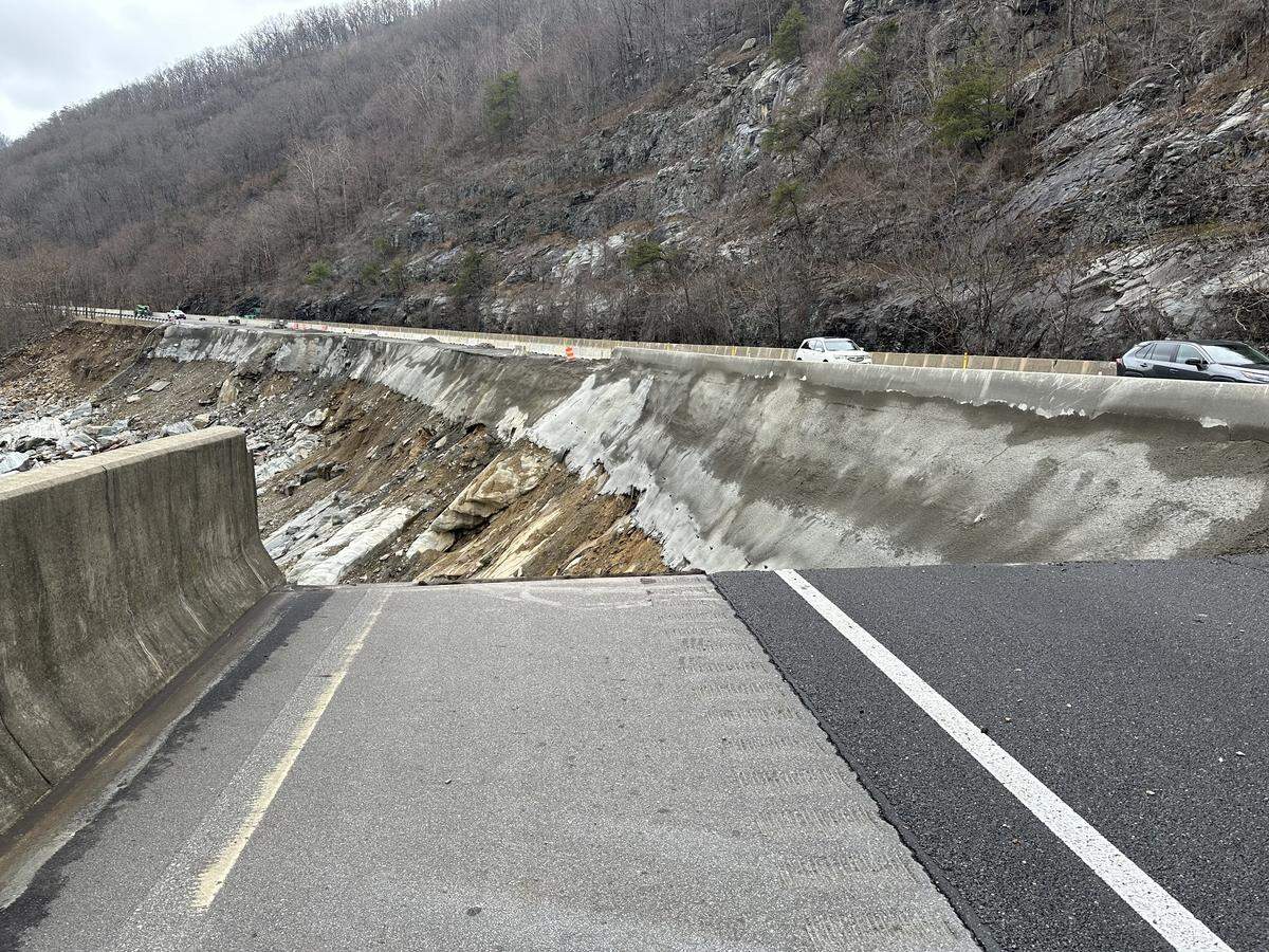 A missing section of the eastbound lanes of Interstate 40 after flooding from the Pigeon River washed away the earth underneath them. Photo taken Feb. 10, 2025.