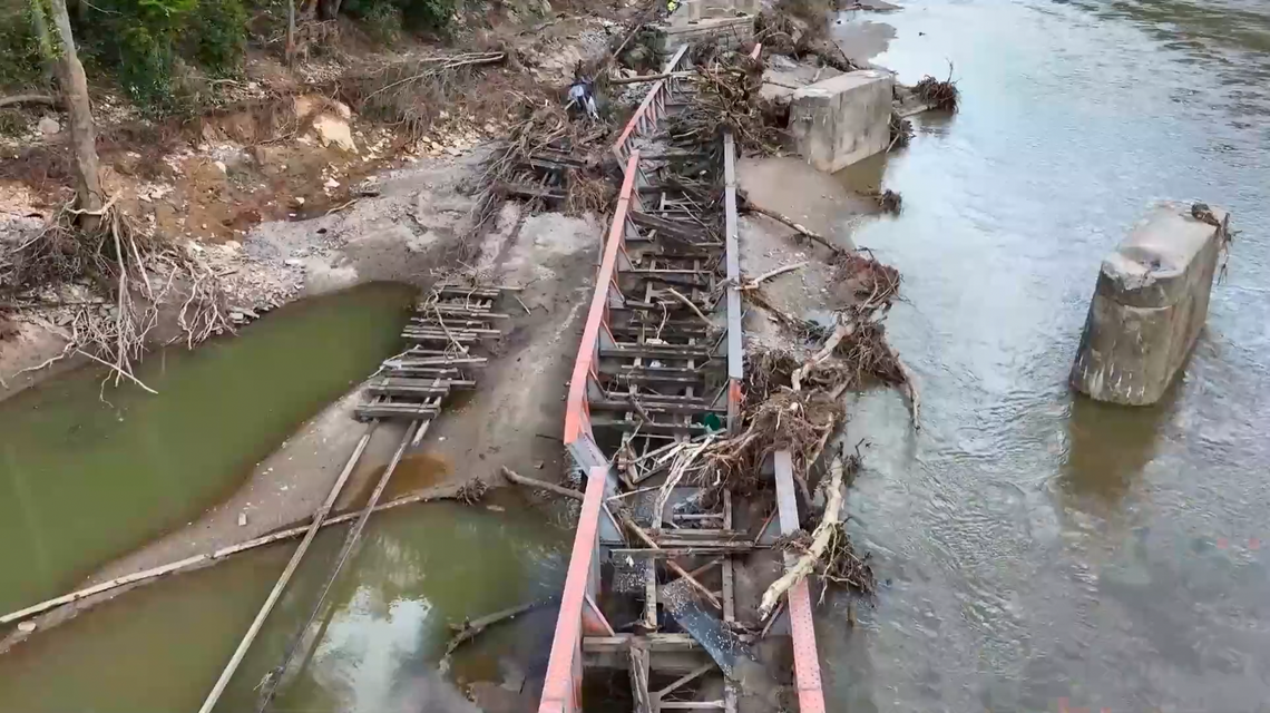 A damaged CSX railroad bridge over the Nolichucky River in Western North Carolina after flooding caused by the remnants of Hurricane Helene in September 2024. The bridge has been rebuilt.