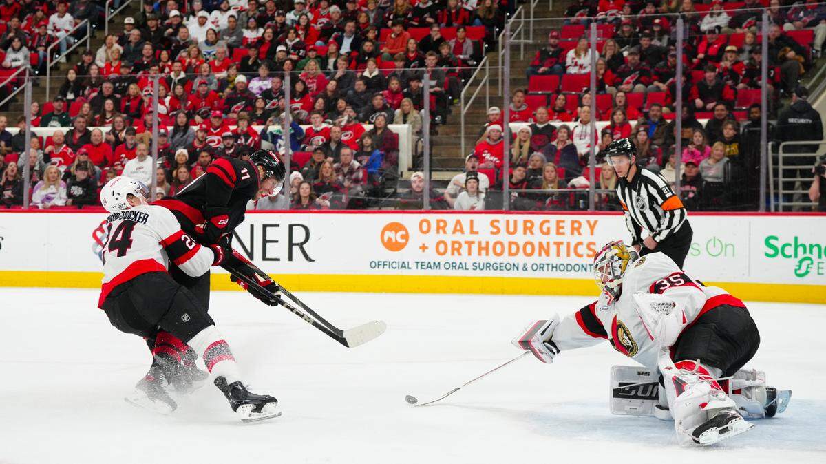 Ottawa Senators goaltender Linus Ullmark (35) and defenseman Jacob Bernard-Docker (24) stop the scoring chance by Carolina Hurricanes center Jordan Staal (11) during the first period at Lenovo Center.