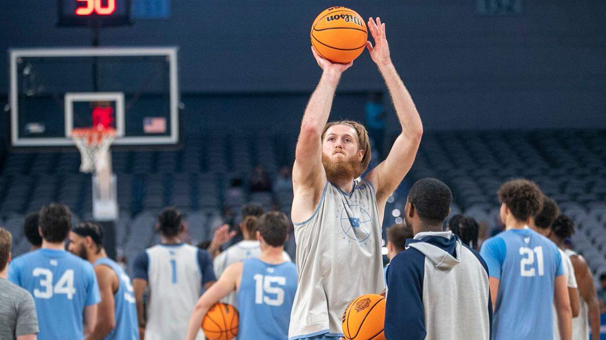North Carolina’s Brady Manek (45) take one last shot before moving with his teammates to the opposite court during the Tar Heels’ practice on Wednesday, March 16, 2022 at Dickies Arena in Ft. Worth, TX.