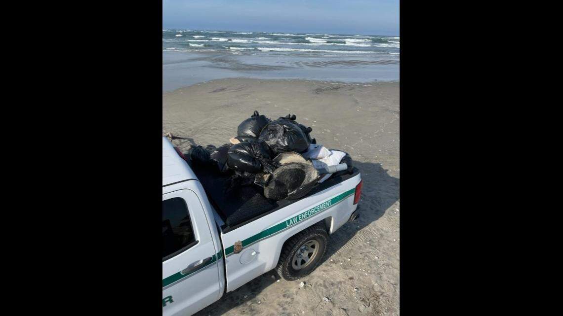 An unsightly wave of trash that is washing ashore along North Carolina’s Outer Banks has been linked to a U.S. Navy ship, according to the National Park Service.