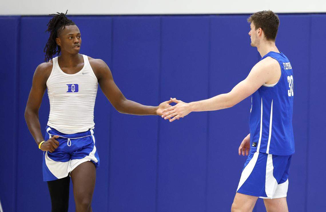 Duke’s Kyle Filipowski and Mark Mitchell finish their drill during the basketball team’s workout at the K Center practice courts in Durham, N.C., Wednesday, July 12, 2023.