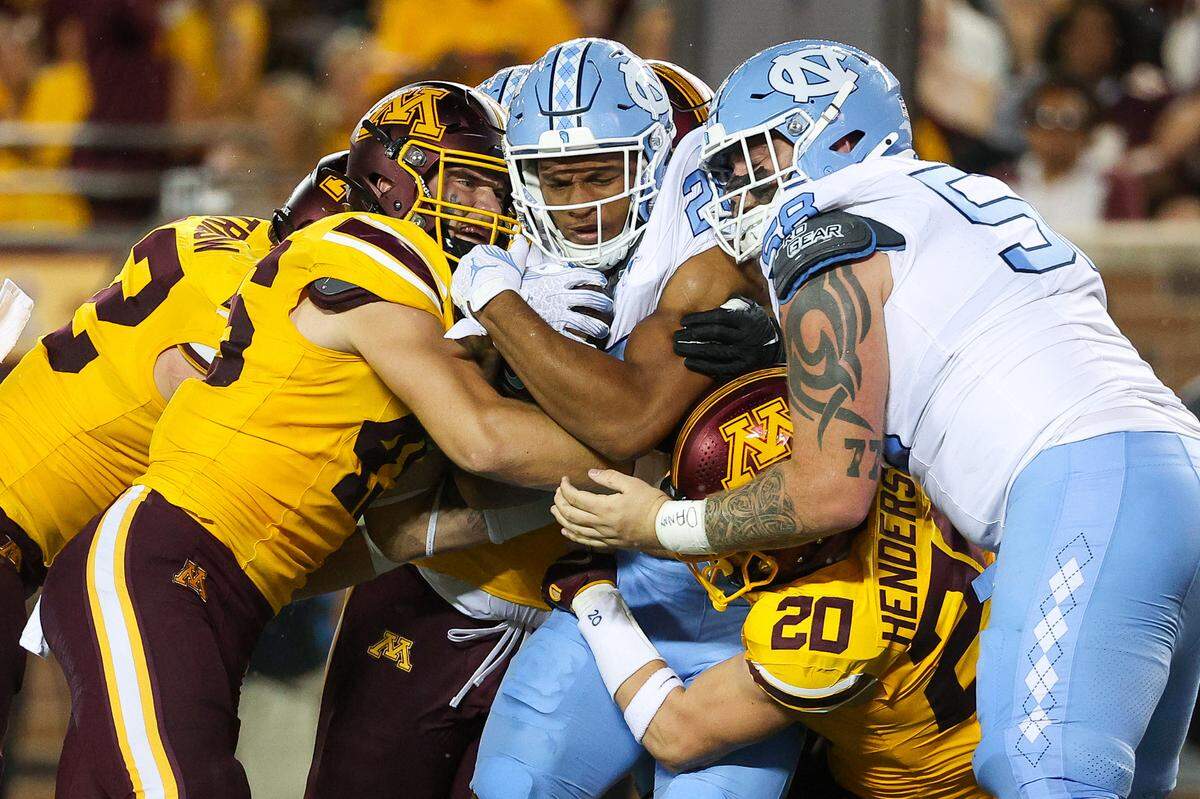North Carolina Tar Heels running back Omarion Hampton (28) runs the ball against the Minnesota Golden Gophers during the first half at Huntington Bank Stadium.