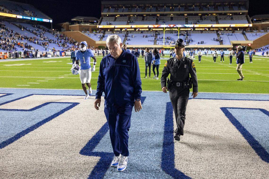 North Carolina coach Mack Brown leaves the field following the Tar Heels’ 31-27 loss to Virginia on Saturday, October 21, 2023 at Kenan Stadium in Chapel Hill, N.C.
