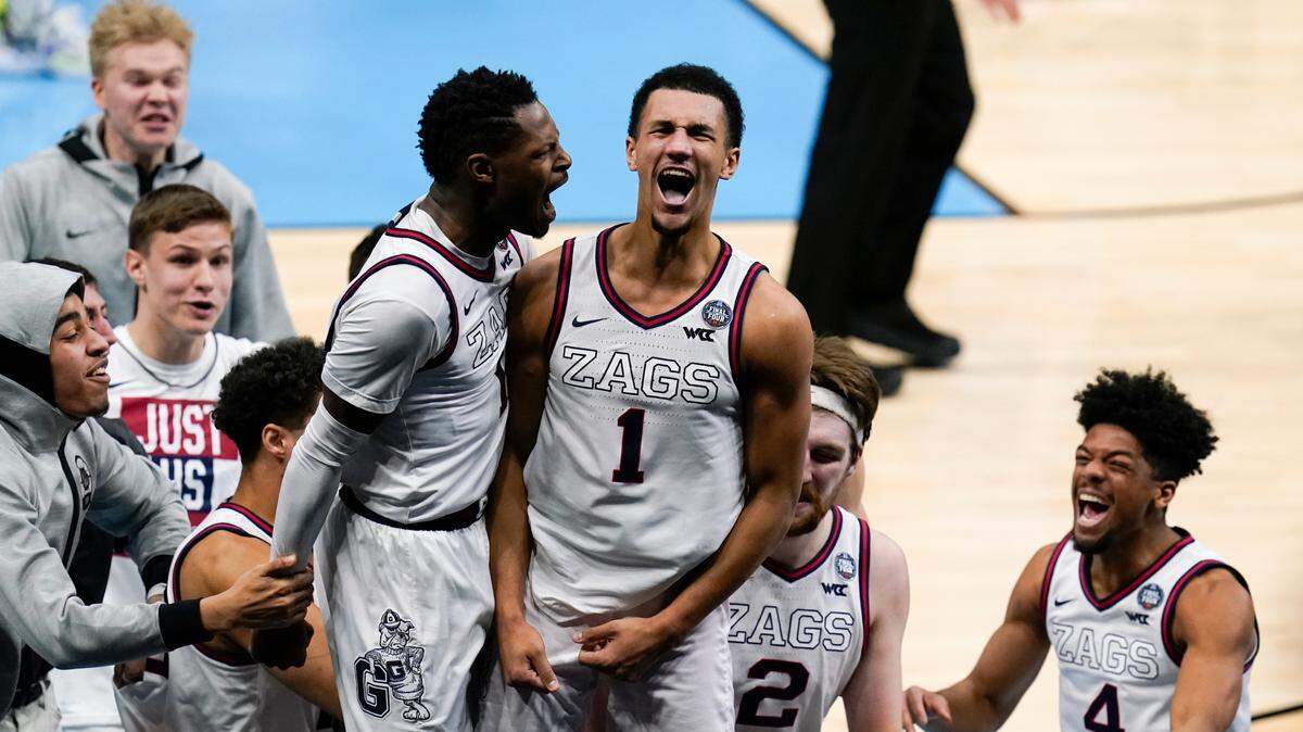 Gonzaga guard Jalen Suggs (1) celebrates making the game winning basket with Joel Ayayi, left, against UCLA during overtime in a men’s Final Four NCAA college basketball tournament semifinal game, Saturday, April 3, 2021, at Lucas Oil Stadium in Indianapolis. Gonzaga won 93-90.