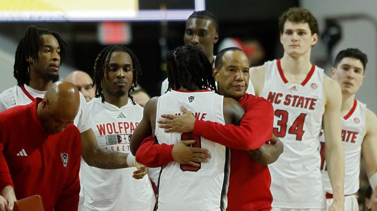 N.C. State head coach Kevin Keatts embraces DJ Horne in the closing minutes of the Wolfpack’s 79-64 loss to Duke on Monday, March 4, 2024, at PNC Arena in Raleigh, N.C.