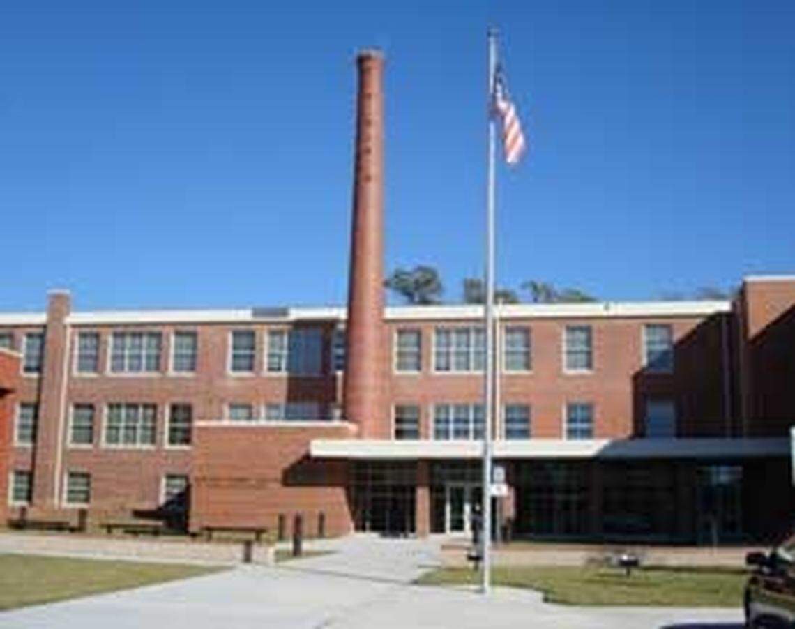 A student at Holton Career and Resource Center has been charged with bringing a firearm onto campus Wednesday.