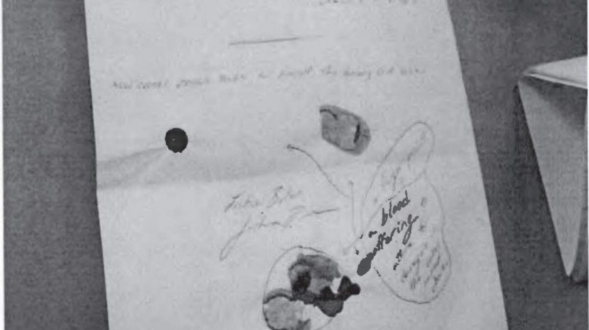 A sample letter with suspected blood stains from inmate Joshua Allen Bolen, included in an investigator’s application for a search warrant.