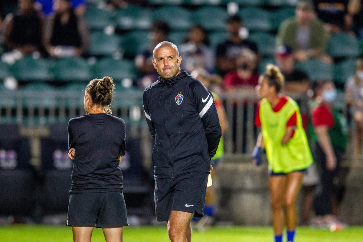 Sean Nahas, interim head coach of the North Carolina Courage, coaches against Racing Louisville Wednesday, Oct. 6, 2021 at WakeMed Soccer Park in Cary. The NC Courage fired coach Paul Riley Thursday after former players have come forward to accuse him of sexual coercion and the NWSL’s player’s union called for an investigation.