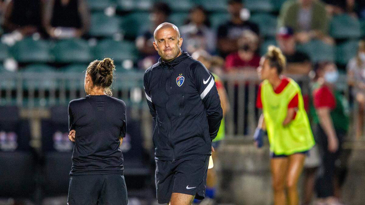 Sean Nahas, interim head coach of the North Carolina Courage, coaches against Racing Louisville Wednesday, Oct. 6, 2021 at WakeMed Soccer Park in Cary. The NC Courage fired coach Paul Riley Thursday after former players have come forward to accuse him of sexual coercion and the NWSL’s player’s union called for an investigation.