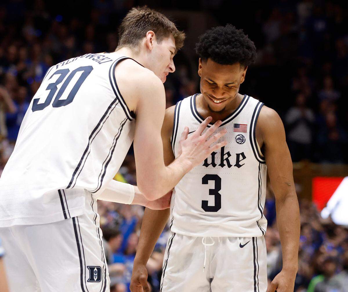 Duke’s Kyle Filipowski (30) talks with Jeremy Roach (3) late in the second half of Duke’s 63-57 victory over UNC at Cameron Indoor Stadium in Durham, N.C., Saturday, Feb. 4, 2023.