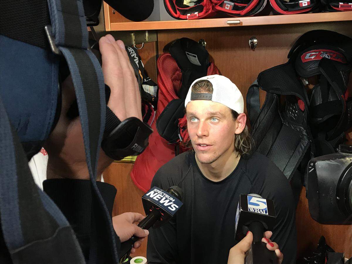 Carolina Hurricanes forward Erik Haula answers media questions during preseason training camp at PNC Arena.