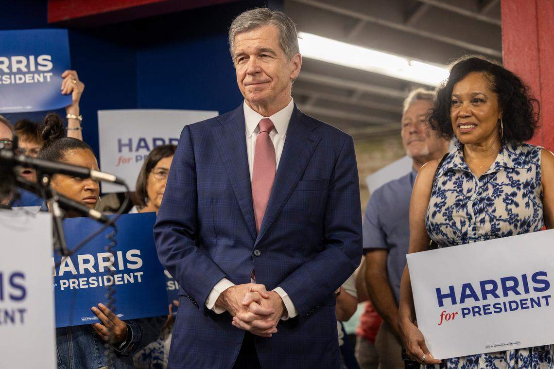Gov. Roy Cooper stands with Kamala Harris supporters during a campaign event in Raleigh on Thursday, July 25, 2024. Cooper is on Vice President Kamala Harris’ short list of potential running mates.