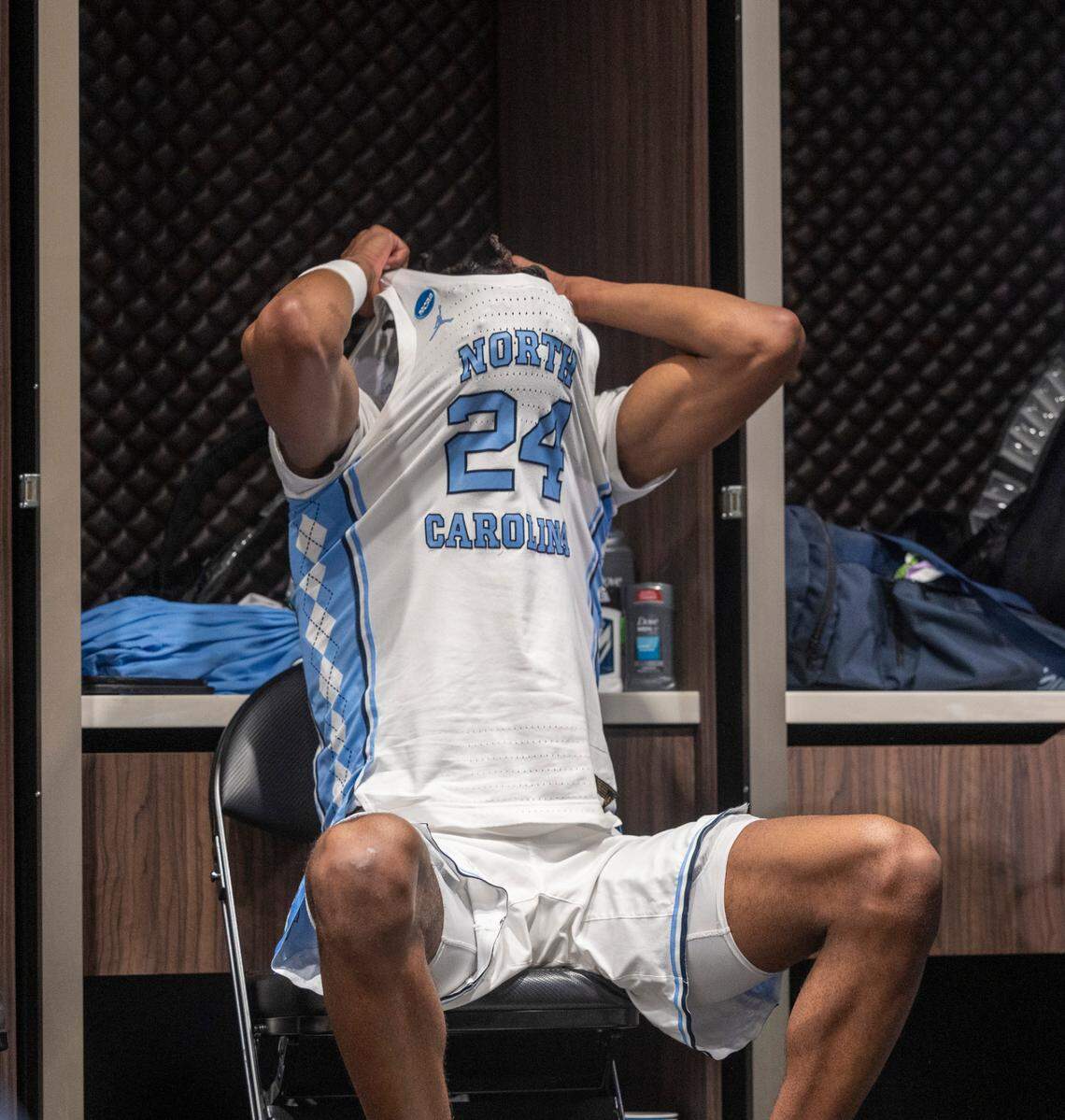 North Carolina’s Jae’Lyn Withers (24) covers his head inside the Tar Heels’ locker room following their 89-87 loss to Alabama in the West Regional Sweet Sixteen on Thursday, March 28, 2024 at Crypto.com Arena in Los Angeles, CA.