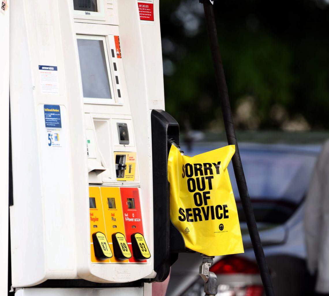 An "out of gas" sign covers a pump at the Circle K station at the corner of Sharon Amity and Randolph Road in Charlotte, N.C., on Tuesday, May 11, 2021.