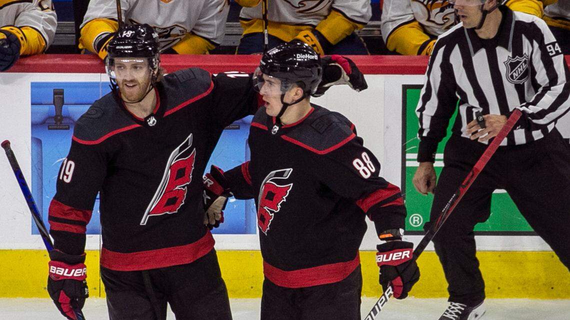 Carolina Hurricanes defenseman Dougie Hamilton (19) congratulates Martin Necas (88) after Necas’ goal in the first period to tie Nashville 1-1 in game five of their first-round Stanley Cup Series in May. Hamilton is a free agent.