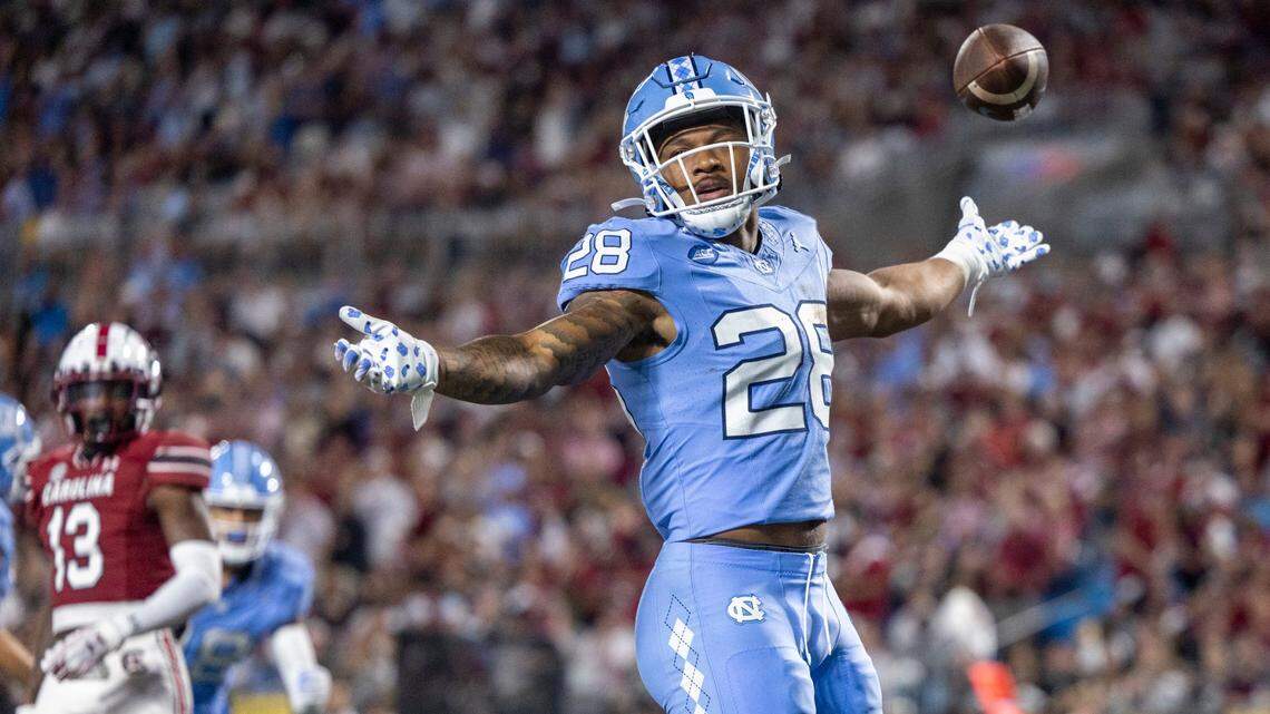 North Carolina’s Omarion Hampton (28) celebrates after scoring on a one yard run to give the Tar Heels a 24-14 lead over South Carolina in the third quarter on Saturday September 2, 2023 at Bank of America Stadium in Charlotte, N.C.