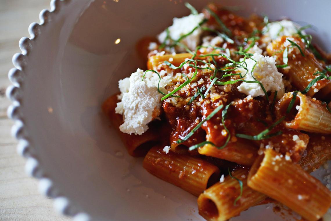 The spicy vodka tomato cream rigatoni is served with diced tomatoes, double cream and ricotta at Cucciolo Osteria in Durham. Cucciolo Terrazza, a sister restaurant to Cucciolo Osteria, just opened in North Hills in Raleigh.