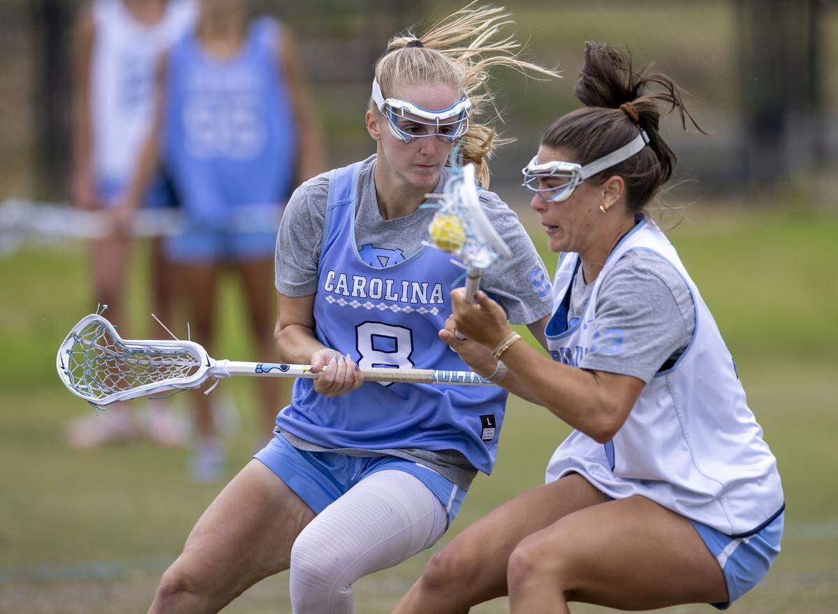 North Carolina defender Sam Forest (8) defends teammate, midfielder Kate Levy (13), during the Tar Heels’ practice on Wednesday, May 6, 2026 in Chapel Hill, N.C. North Carolina is preparing for NCAA Tournament play.