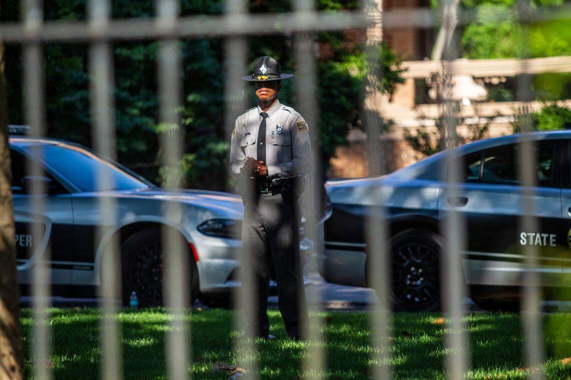 A State Highway Patrol officer stands guard during an anti-racism protest outside the Executive Mansion in Raleigh Wednesday, June 3, 2020.