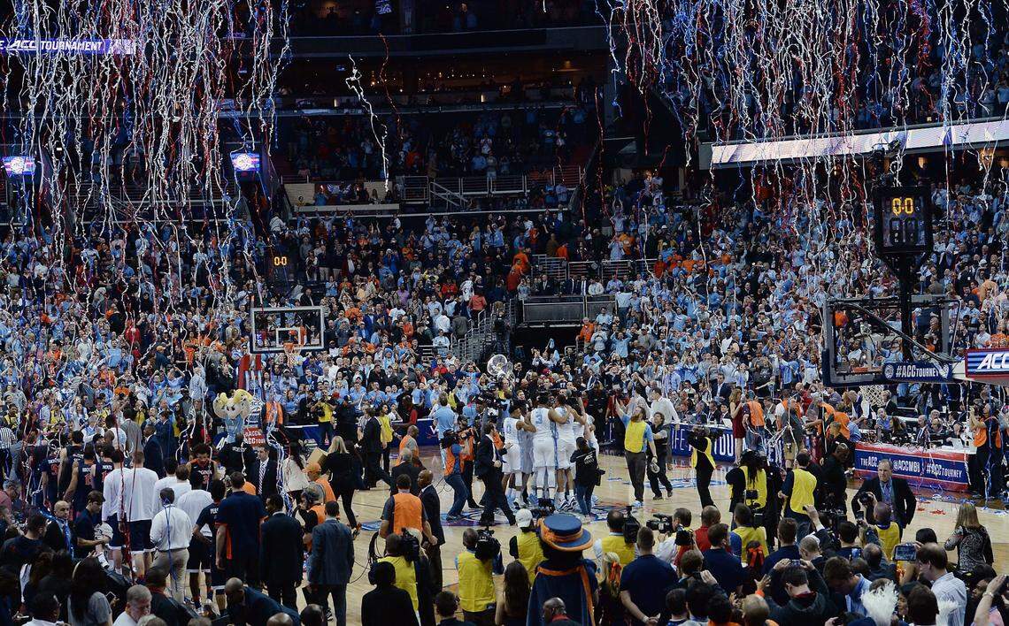 The UNC team celebrates at midcoast as time runs out on the Cavaliers. UNC won the ACC Tournament defeating Virginia 61-57 at the Verizon Center in Washington, D.C. Saturday, March 12, 2016.