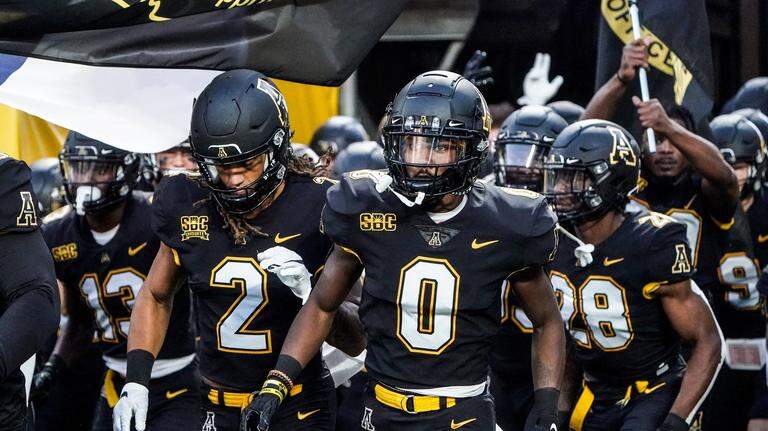 Photos: ECU battles Appalachian State in college football action