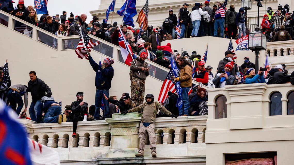 Pro-Trump supporters storm the U.S. Capitol following a rally with President Donald Trump on Wednesday, Jan. 6, 2021 in Washington, D.C. Congress held a joint session today to ratify President-elect Joe Biden’s 306-232 Electoral College win over President Donald Trump. A group of Republican senators said they would reject the Electoral College votes of several states unless Congress appointed a commission to audit the election results.