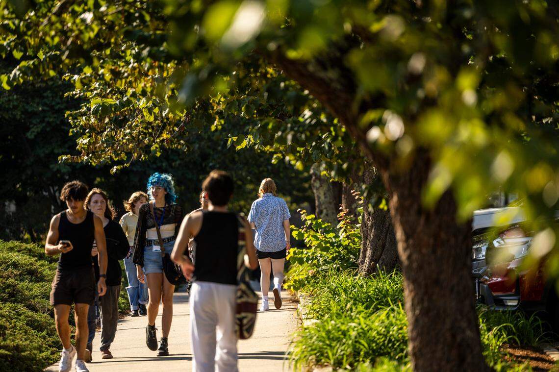 Students walk on UNC-Asheville’s campus on Friday, Aug. 15, 2024. Four departments are being eliminated from the liberal arts university’s curriculum.