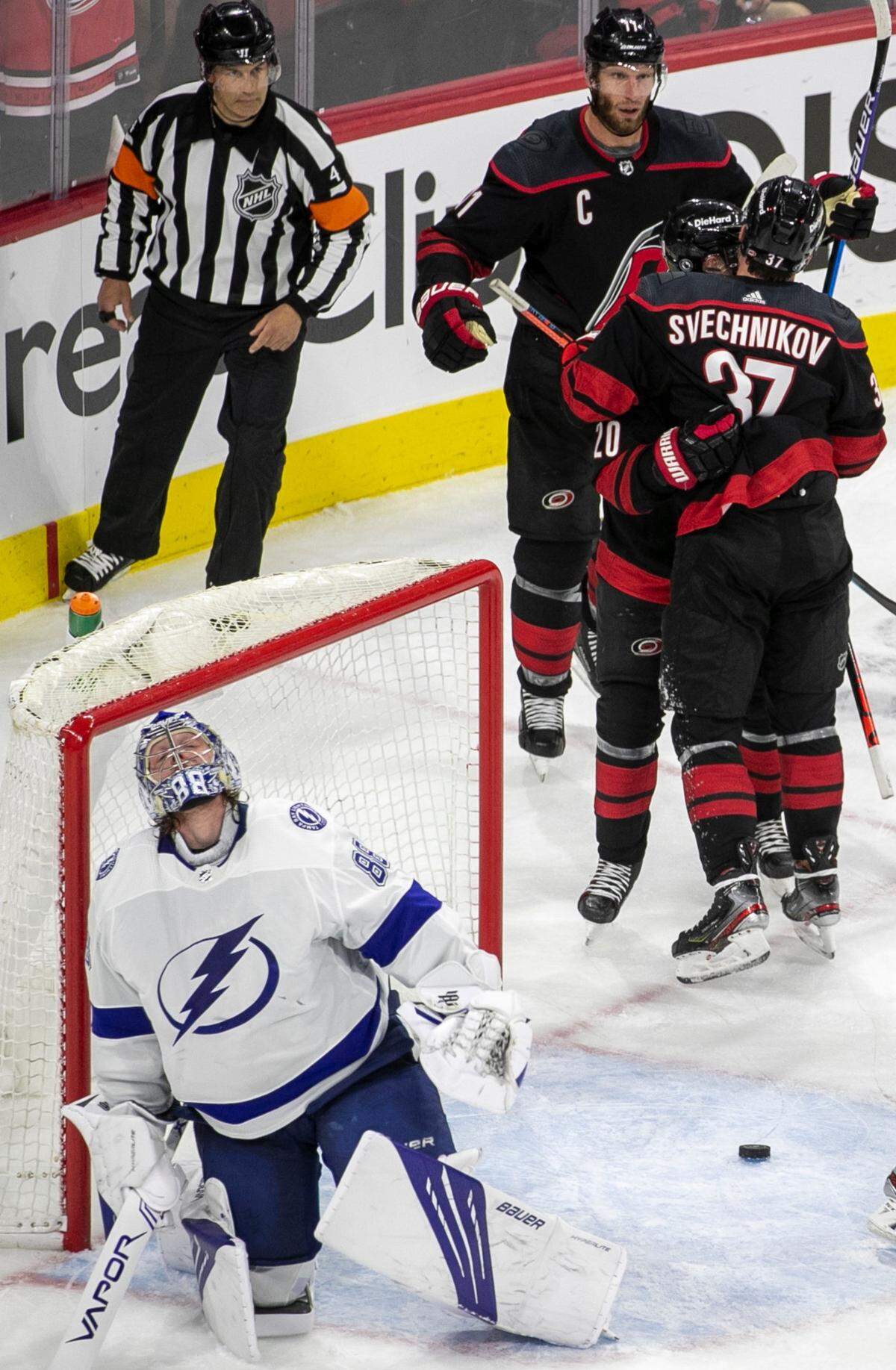 Tampa Bay goalie Andrei Vasilevskiy (88) reacts after giving up a goal to Carolina Hurricanes’ Andrei Svechnikov (37) in the third period of game two of their second round Stanley Cup series on Tuesday, June 1, 2021 at PNC Arena in Raleigh, N.C.