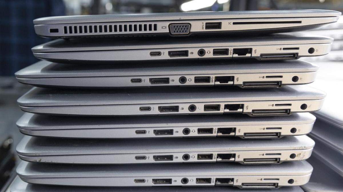 Laptops are sorted as the final step before being sent out to groups and individuals for donations at Kramden Institute in Durham.