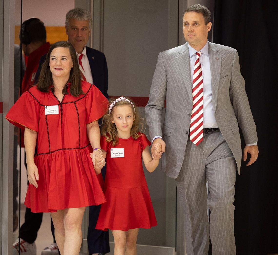 Will Wade, his wife Lauren and daughter Carolina enter Reynolds Coliseum for his formal introduction as the new Men’s basketball coach at N. C. State on Tuesday, March 25, 2025 in Raleigh, N.C. 