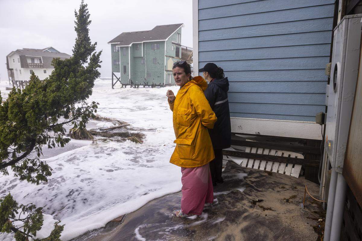 Veteran News & Observer reporter Martha Quillin covers a nor’easter in Buxton in October 2025.