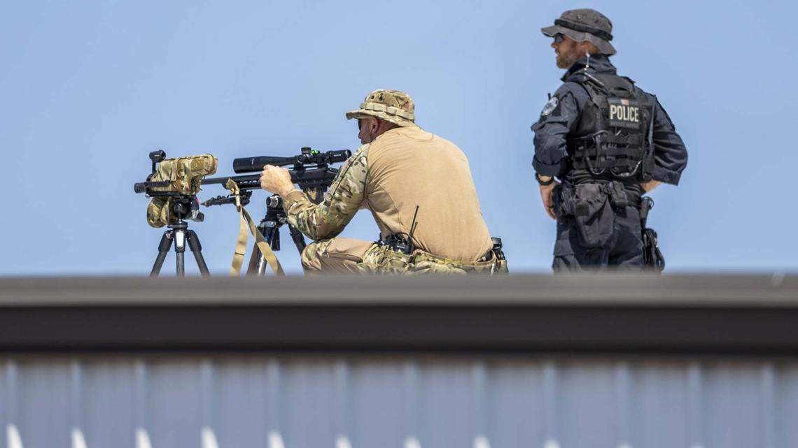 Law enforcement marksmen set up on top of a building at the campaign rally for Donald Trump in Asheboro, N.C., Wednesday, August 21, 2024.