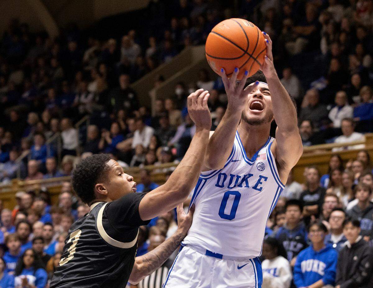 Duke’s Jared McCain drives past UNC Pembroke’s JaJuan Carr during the first half of the Blue Devils’ exhibition game on Wednesday, Nov. 1, 2023, at Cameron Indoor Stadium in Durham, N.C.