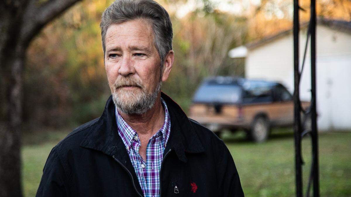 Leslie McCrae Dowless poses for a portrait outside of his home in Bladenboro, NC on Dec. 5, 2018.