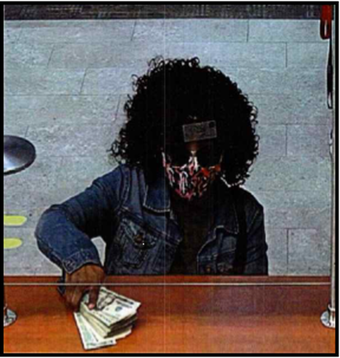 Durham Police included this photo of a suspect who allegedly robbed four banks in Durham. The first one was in October and the most recent in July 2022.