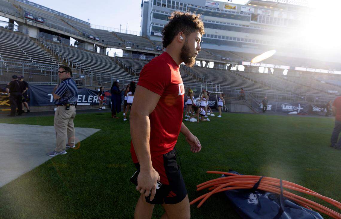 N.C. State running back Jordan Houston (3) walks onto the field to warmup before the Wolfpack’s’ game against UConn at Rentschler Field in East Hartford, Conn. Thursday, August 31, 2023.