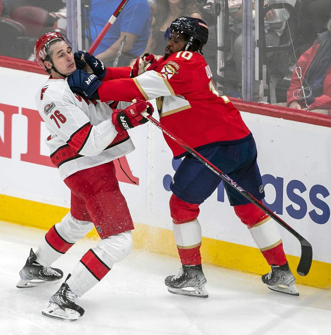 The Florida Panthers Anthony Duclair (10) checks the Carolina Hurricanes Brady Skjei (76) in the second period of Game 3 of the Eastern Conference Finals on Monday, May 22, 2023 at FLA Live Arena in Sunrise, Fla.