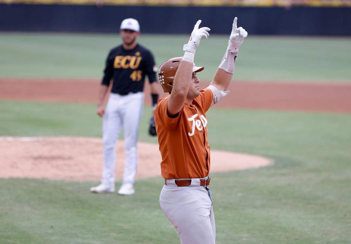 Texas Ivan Melendez (17) heads home after hitting a three-run homerun in the first inning during ECUs game against Texas in the Greenville Super Regional at Clark-LeClair Stadium Sunday, June 12, 2022.